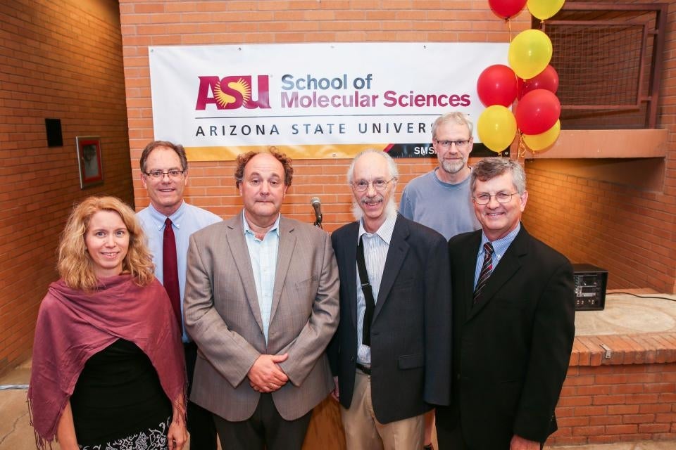 Group photo of ASU faculty, including Professor Dan Buttry, at a school opening event.