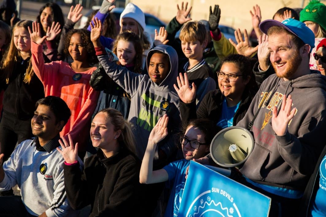 group of volunteers posing for photo