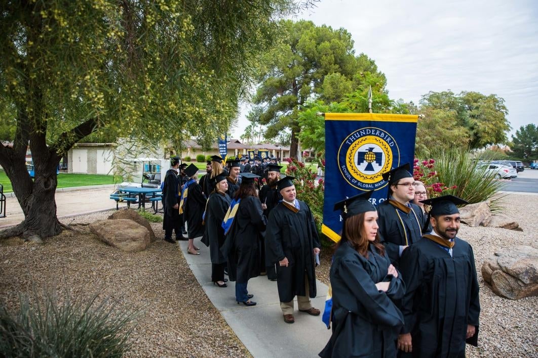 Students line up before the Thunderbird convocation.