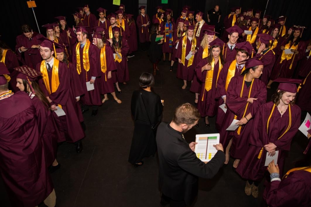 Graduates line up for convocation.