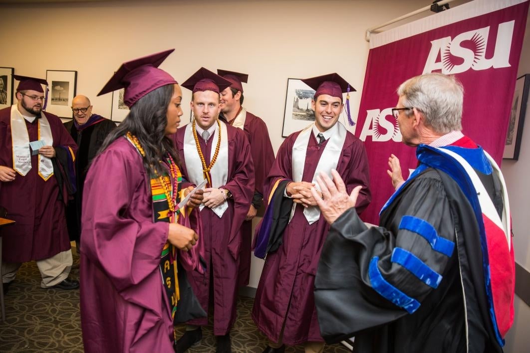 group of ASU law grads talking before convocation