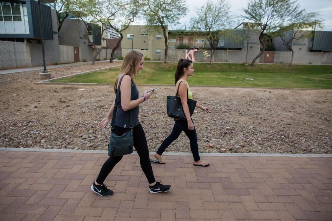 Woman walking on a path.