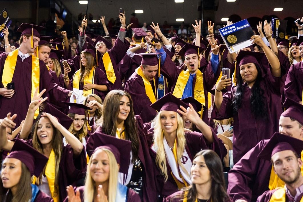 students celebrating at commencement