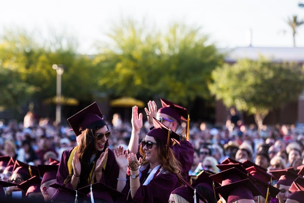 graduates cheering