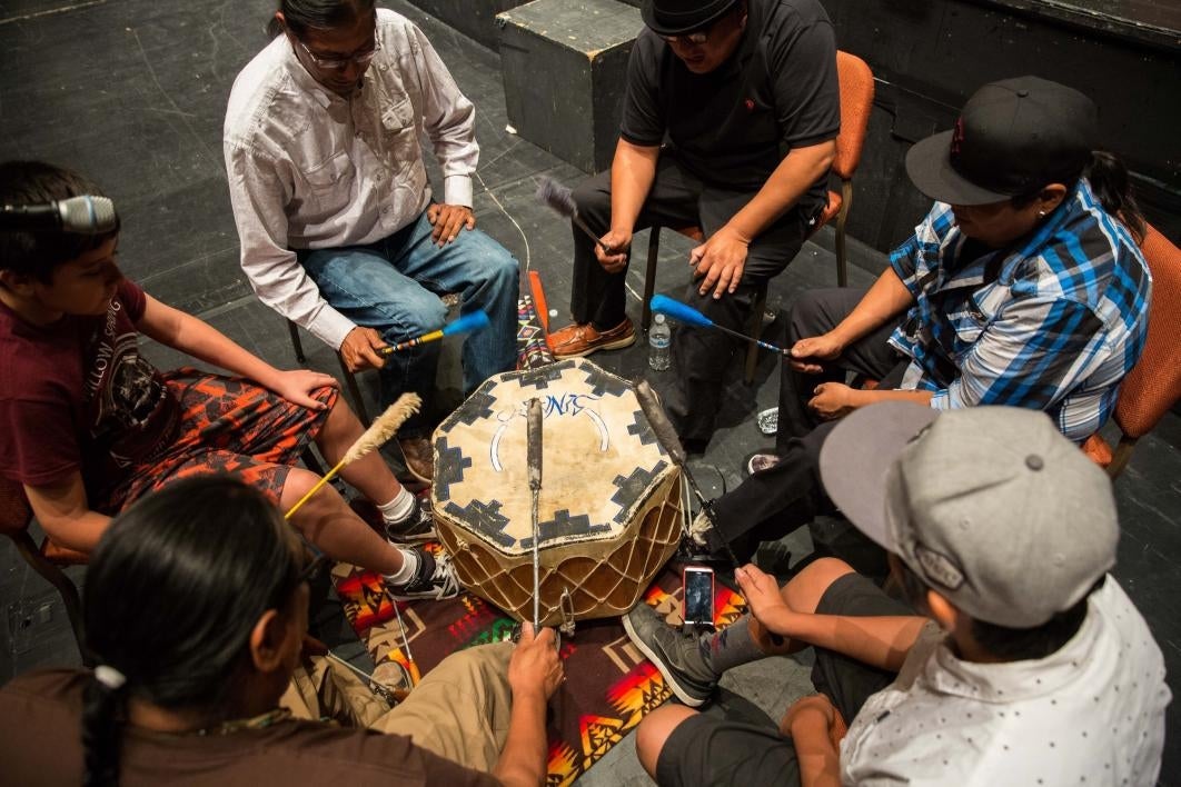 Drummers playing in a circle