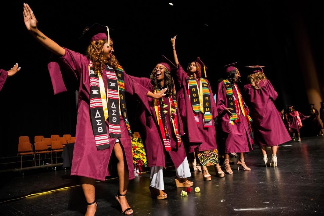 ASU graduates crossing stage at convocation