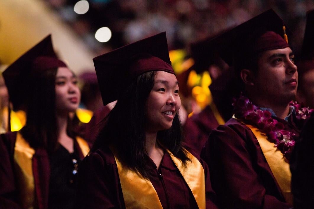 graduates listening to convocation speech