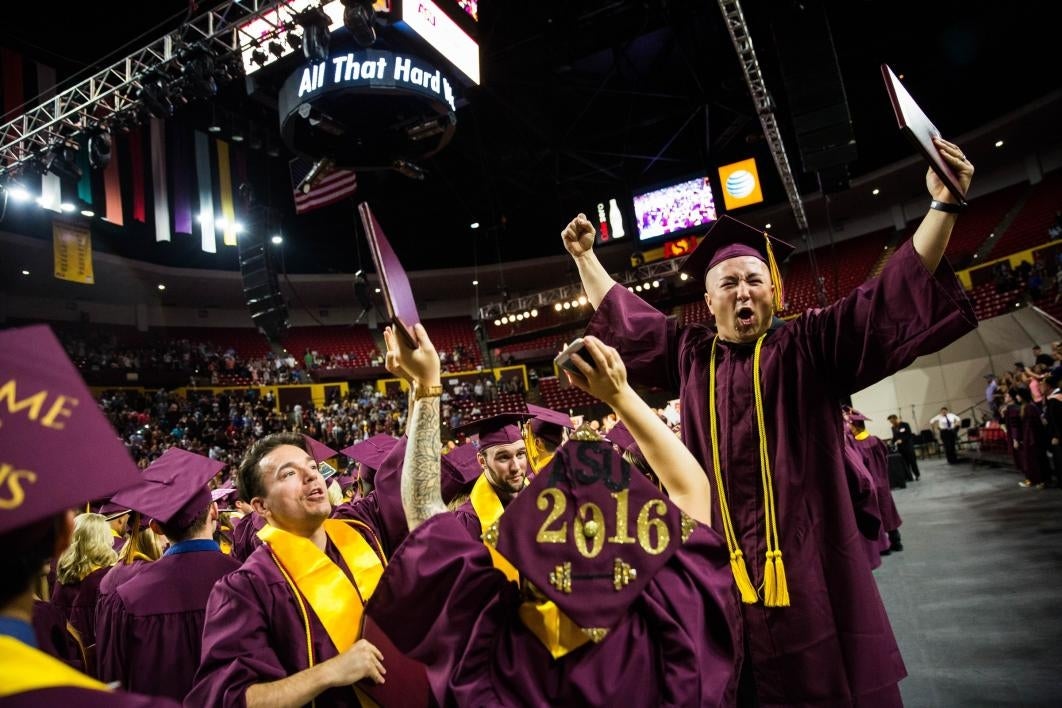 graduate celebrating