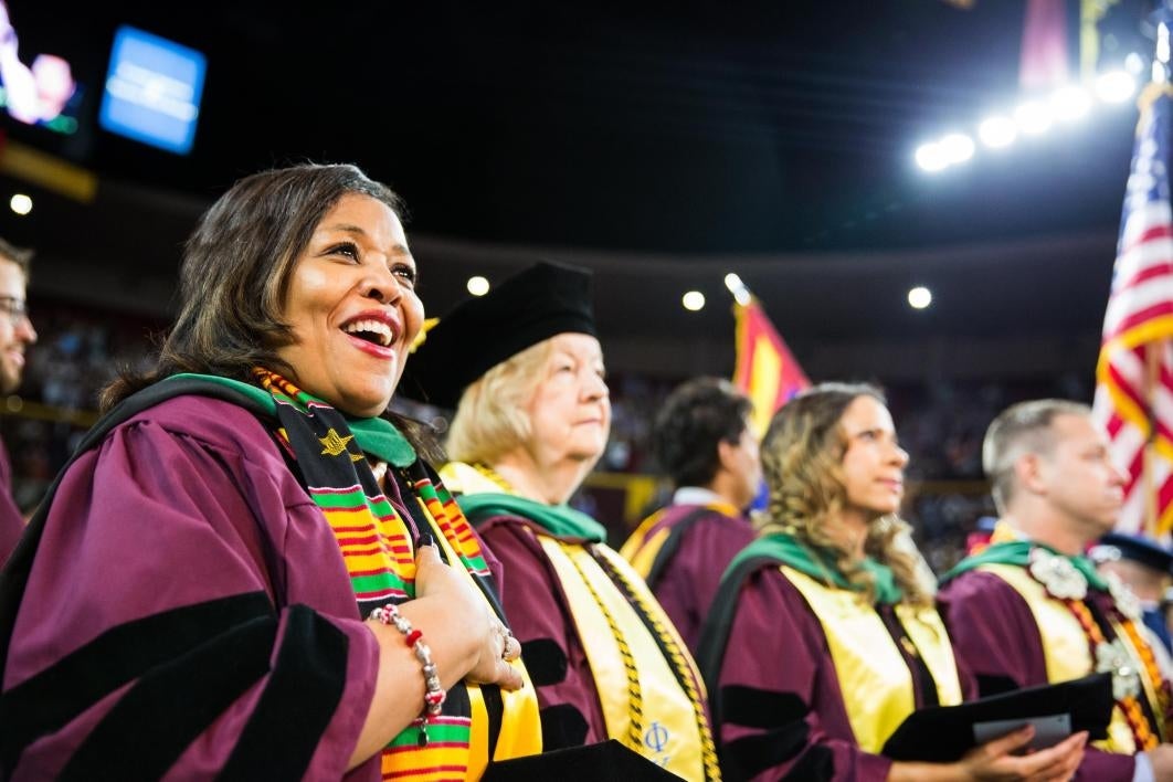 graduate singing national anthem