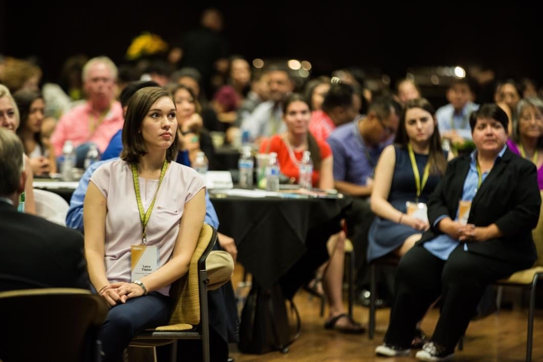 Attendees listen to speakers at the NASAI conference