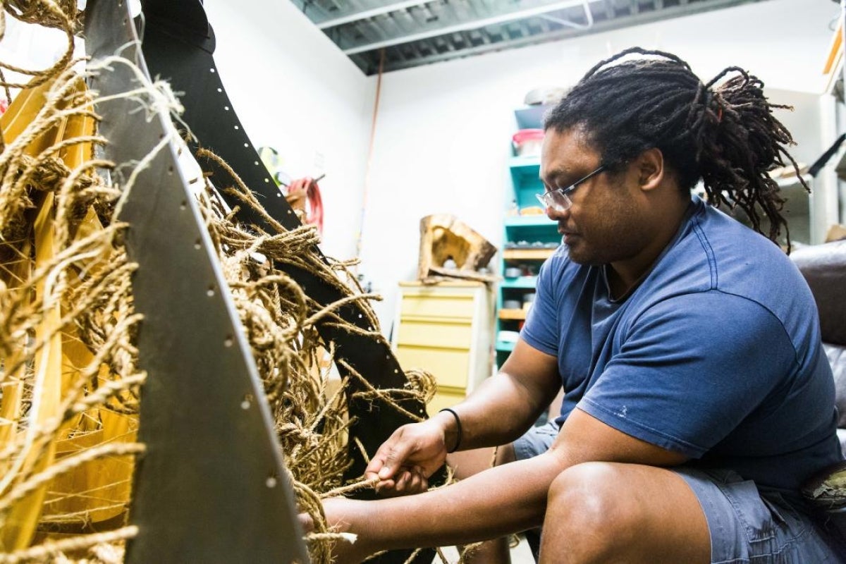 ASU artist Alvin Huff works on a sculpture