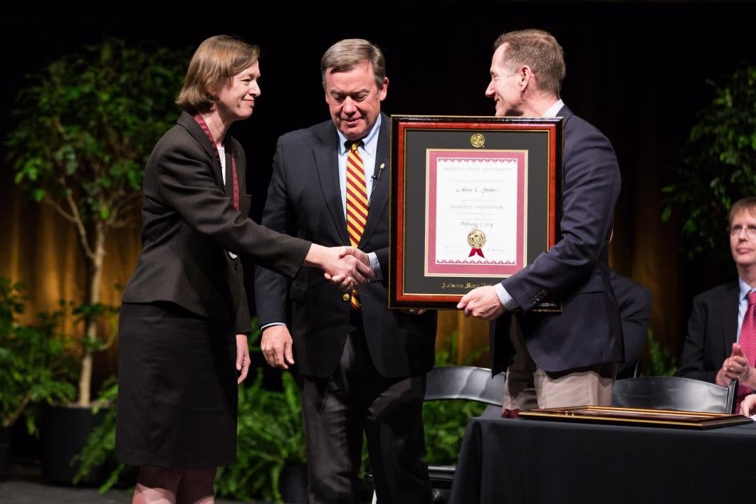 anne stone is presented with her regents title