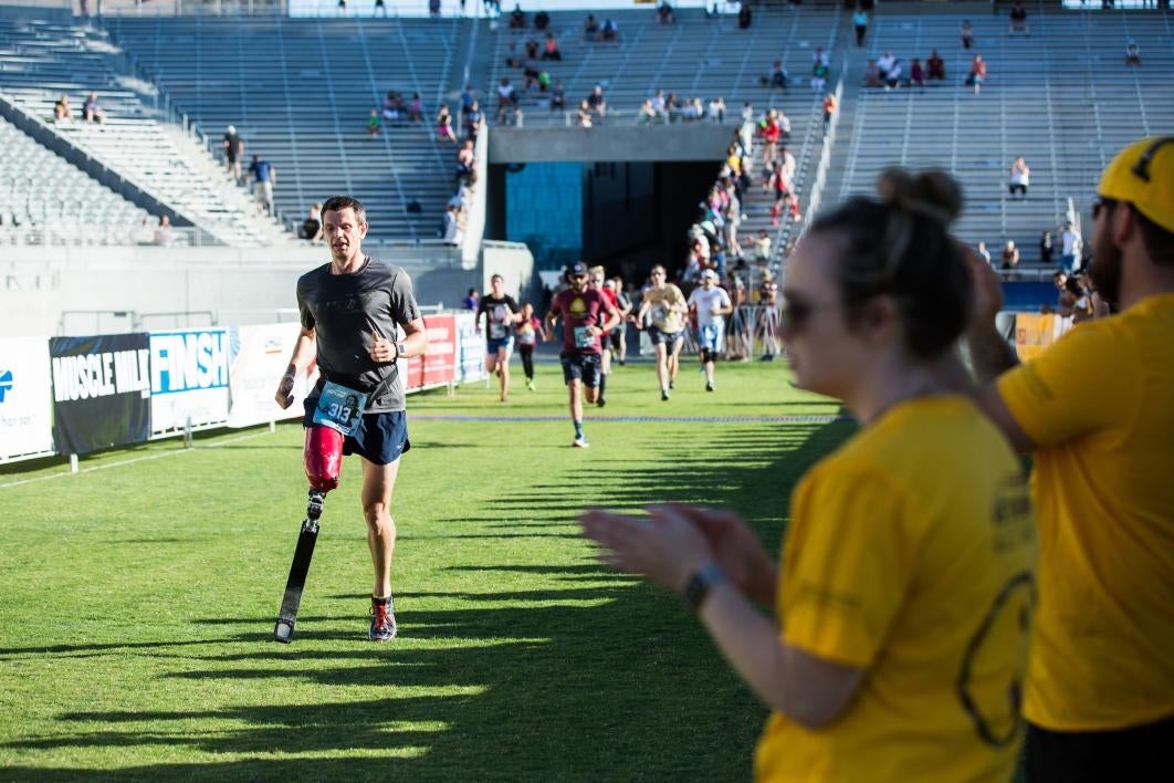 An amputee nears the finish line at Pats Run