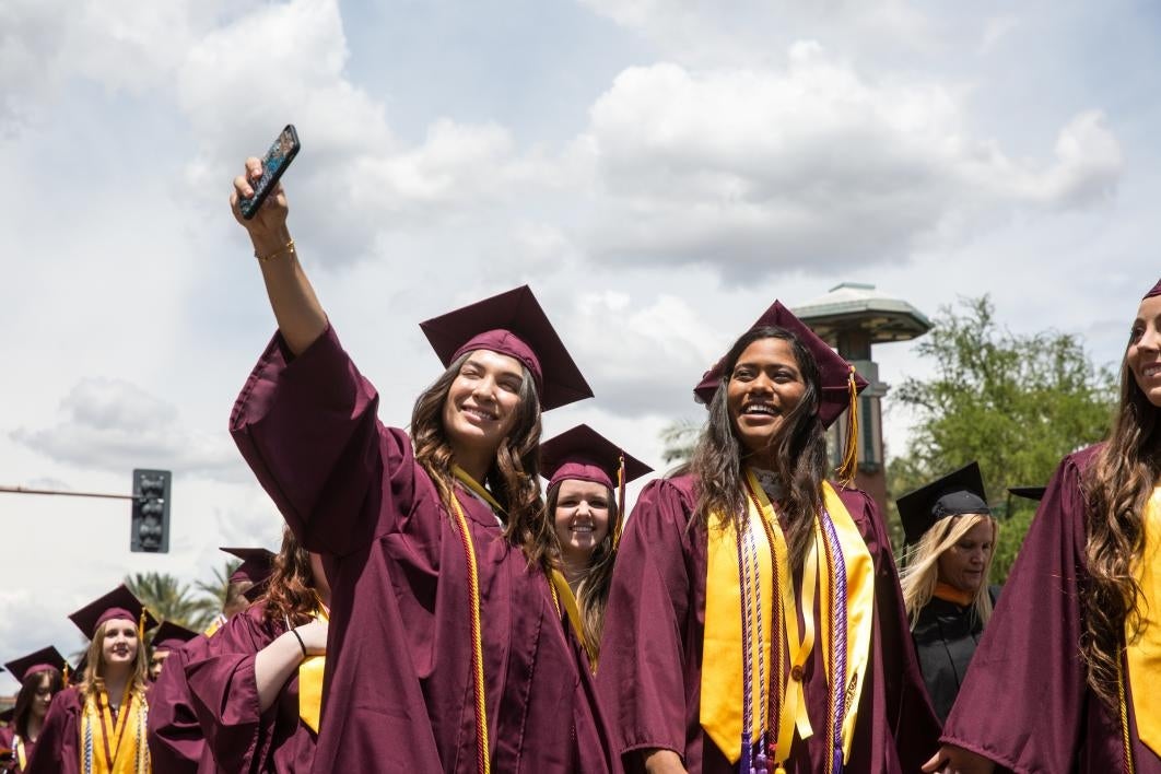 graduates taking a selfie