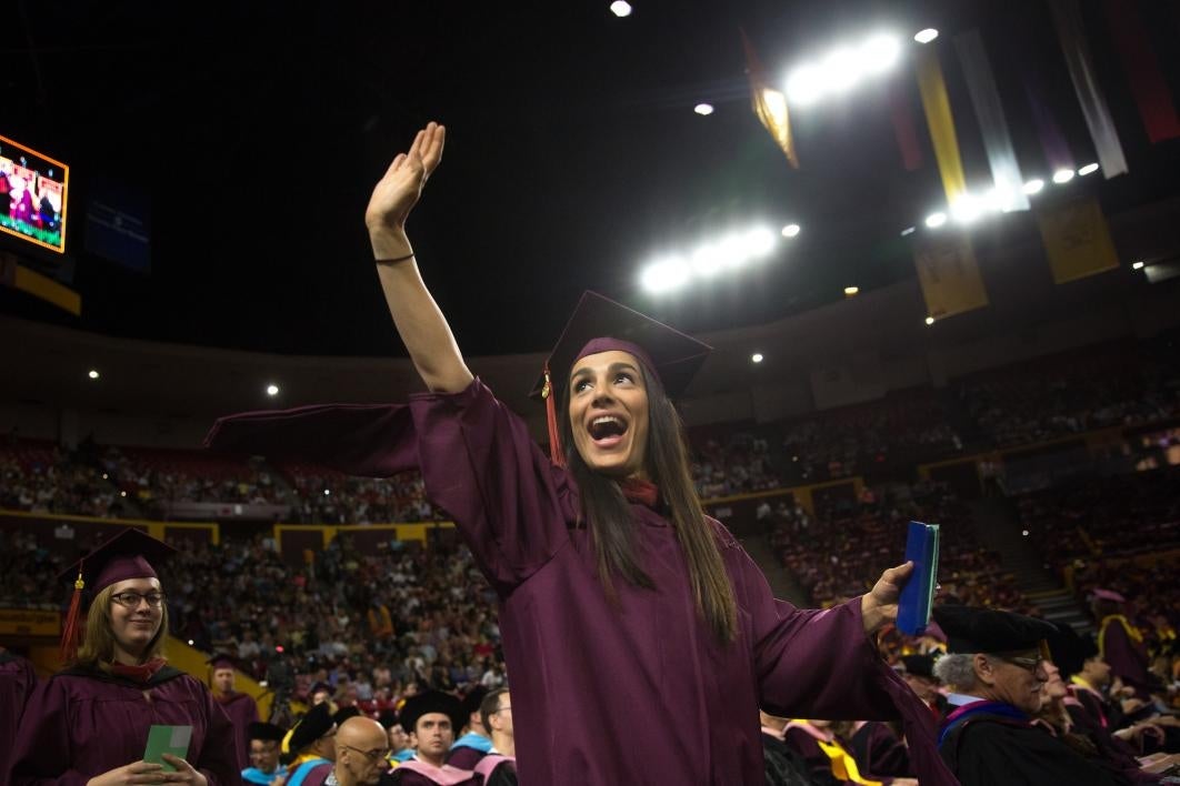 graduate waving