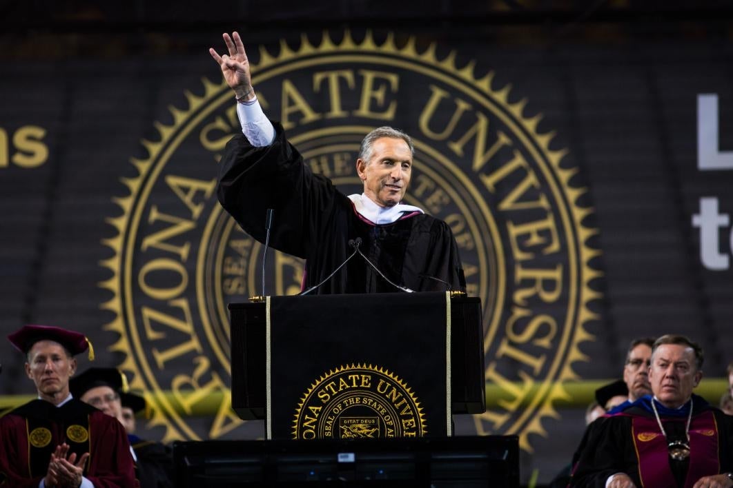 man speaking at graduation