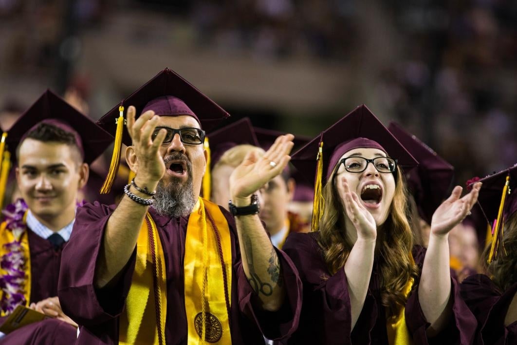 graduates cheering