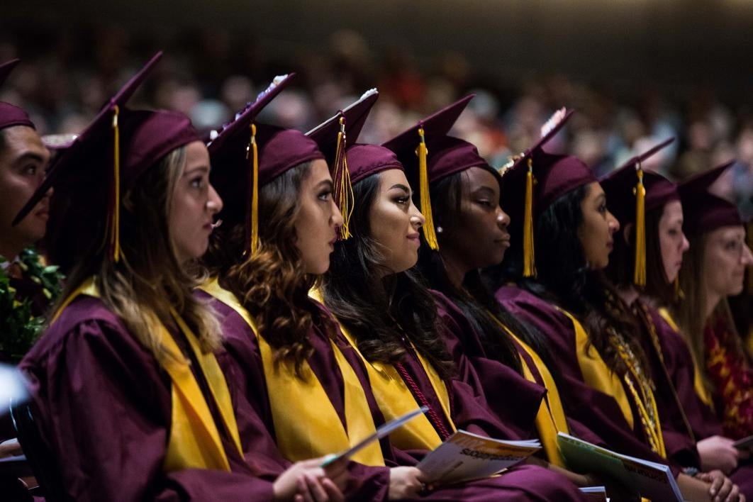 graduates listening to speech