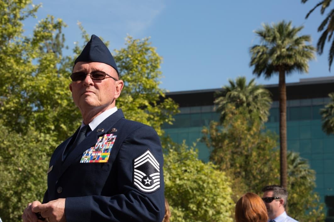 man watching ceremony