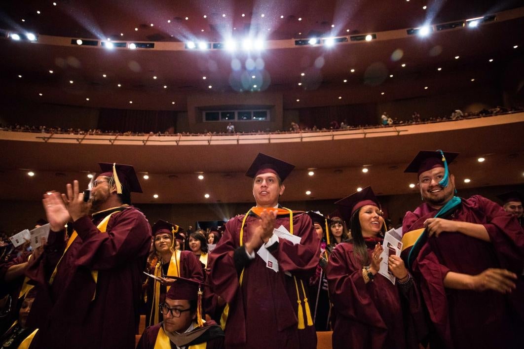 graduates applauding