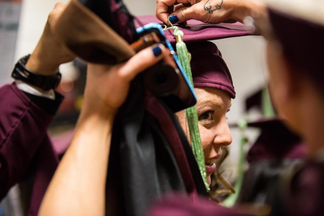 graduate having tassle attached