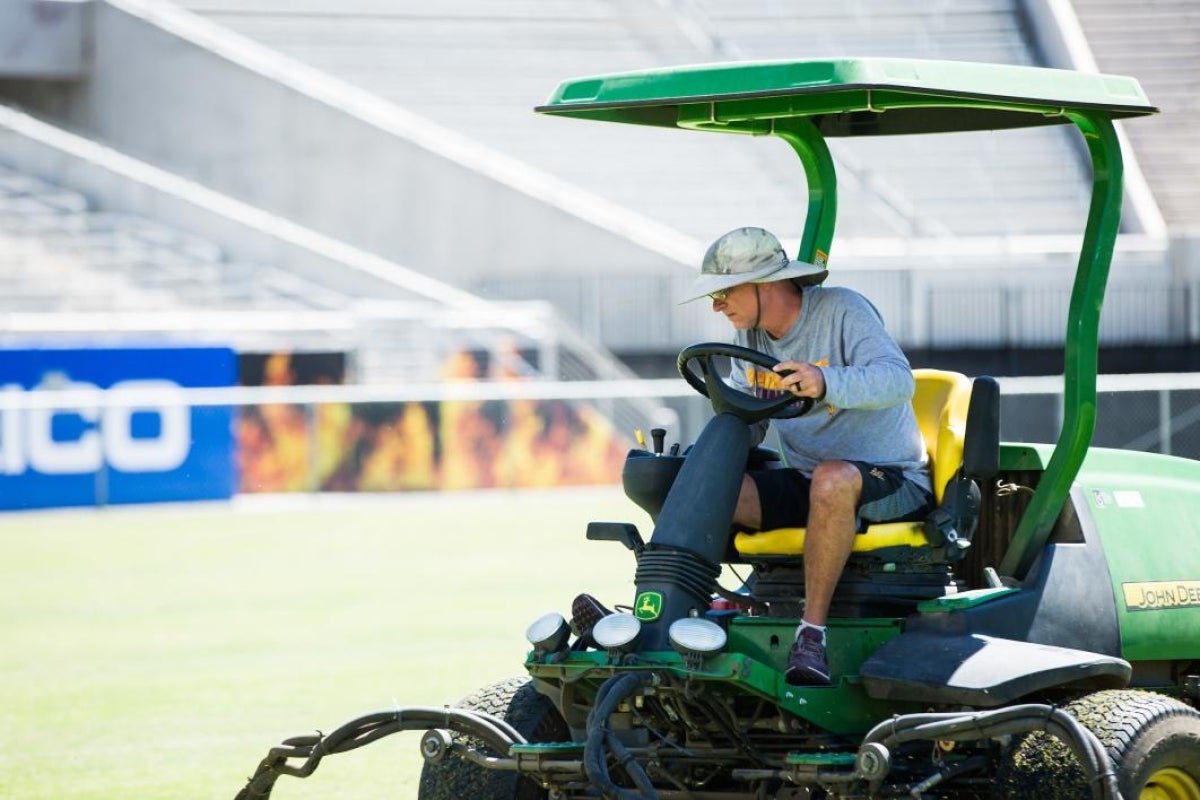 Man riding tractor