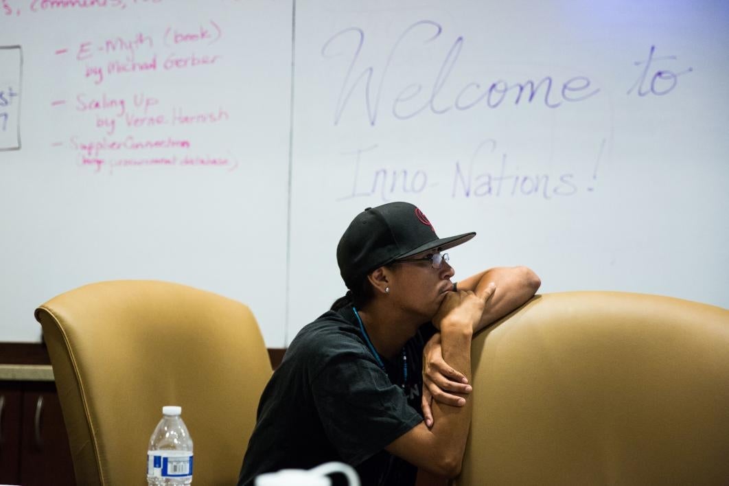 Native entrepreneurs listen during a seminar