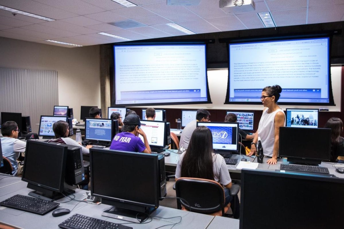 Westwood High School teacher Audrey Napoleone guides ASU Inspire students through creating their action research plan and website