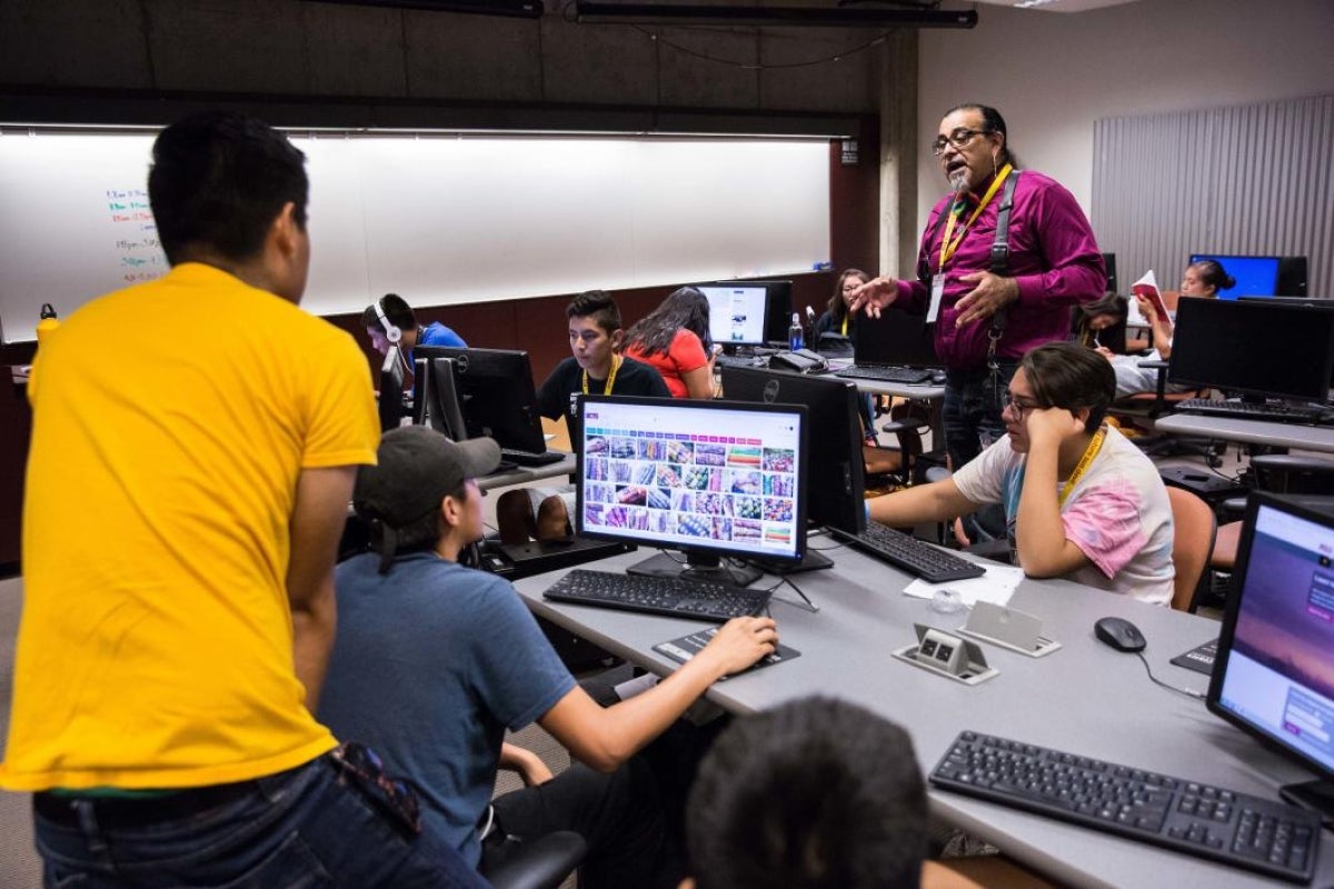 ASU English instructor and Inspire mentor Henry Quintero talks to students about Indigenous agriculture