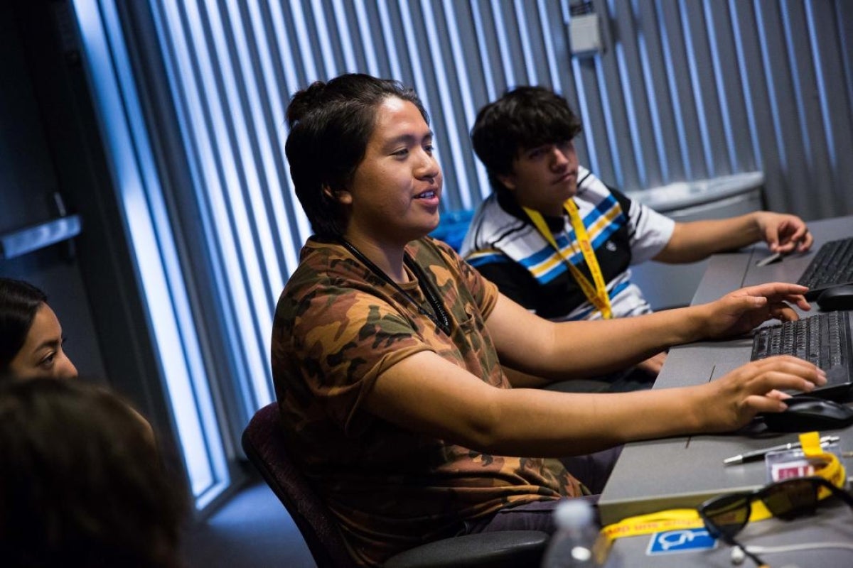 Alchemy High School junior Tenai Tortice works with his group during ASU's Inspire program