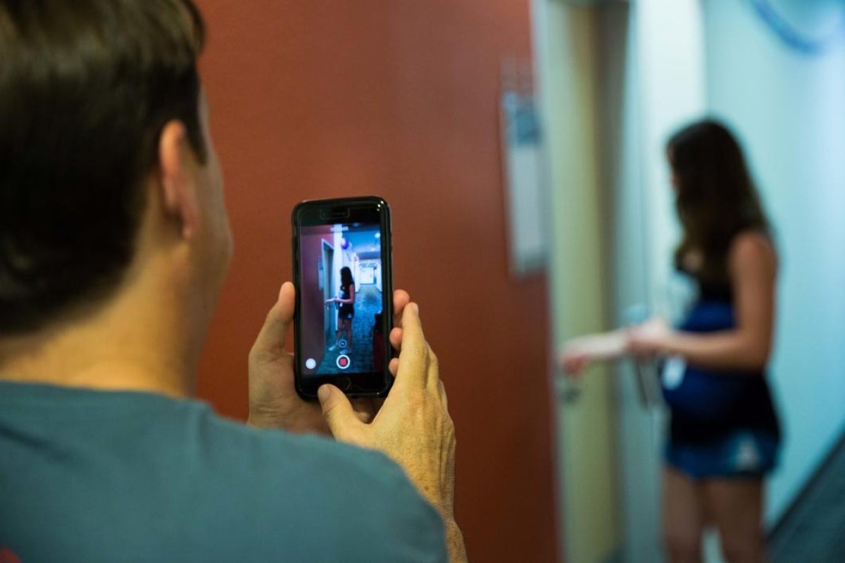 A dad films his daughter moving into the dorm at ASU