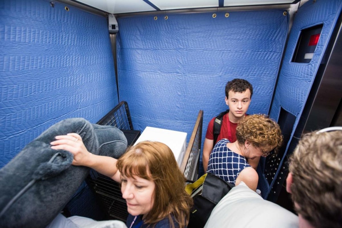 A crowded elevator during move-in