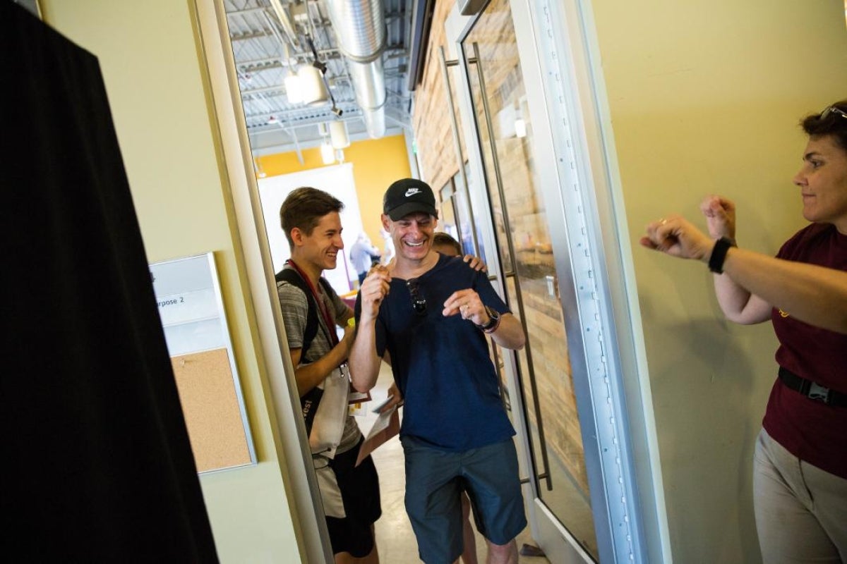 A dad dances at move-in