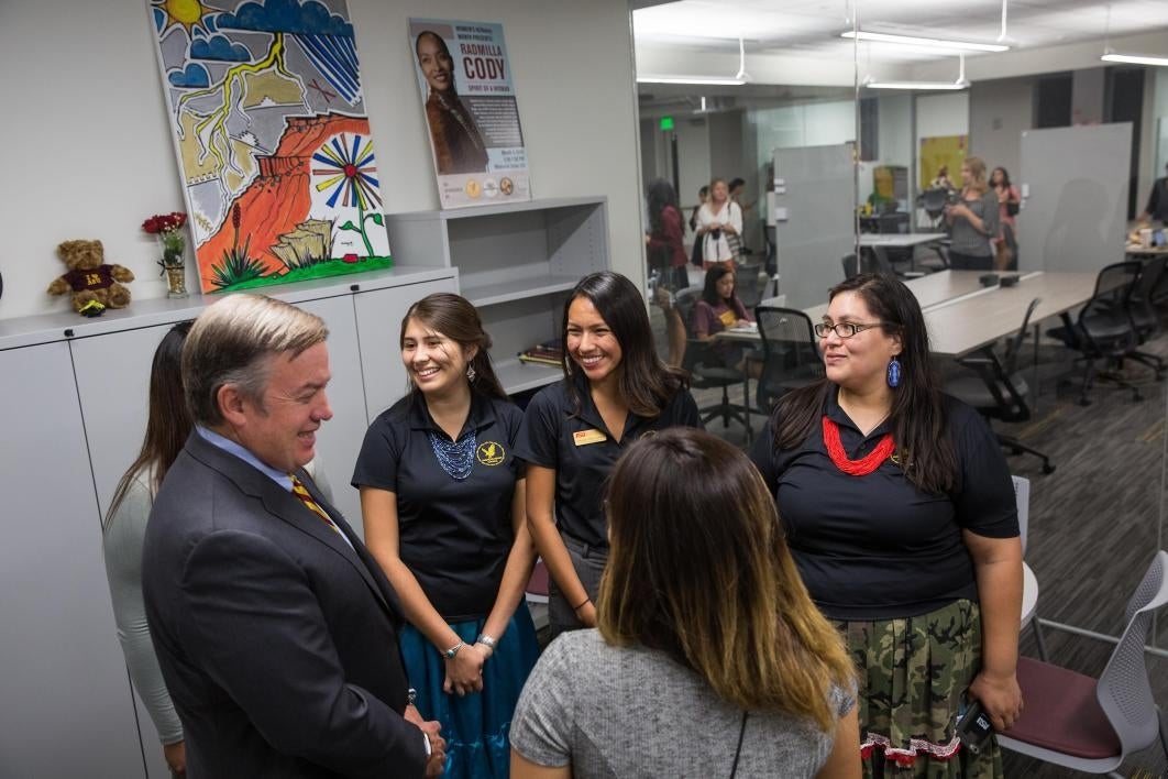 ASU President talking with students