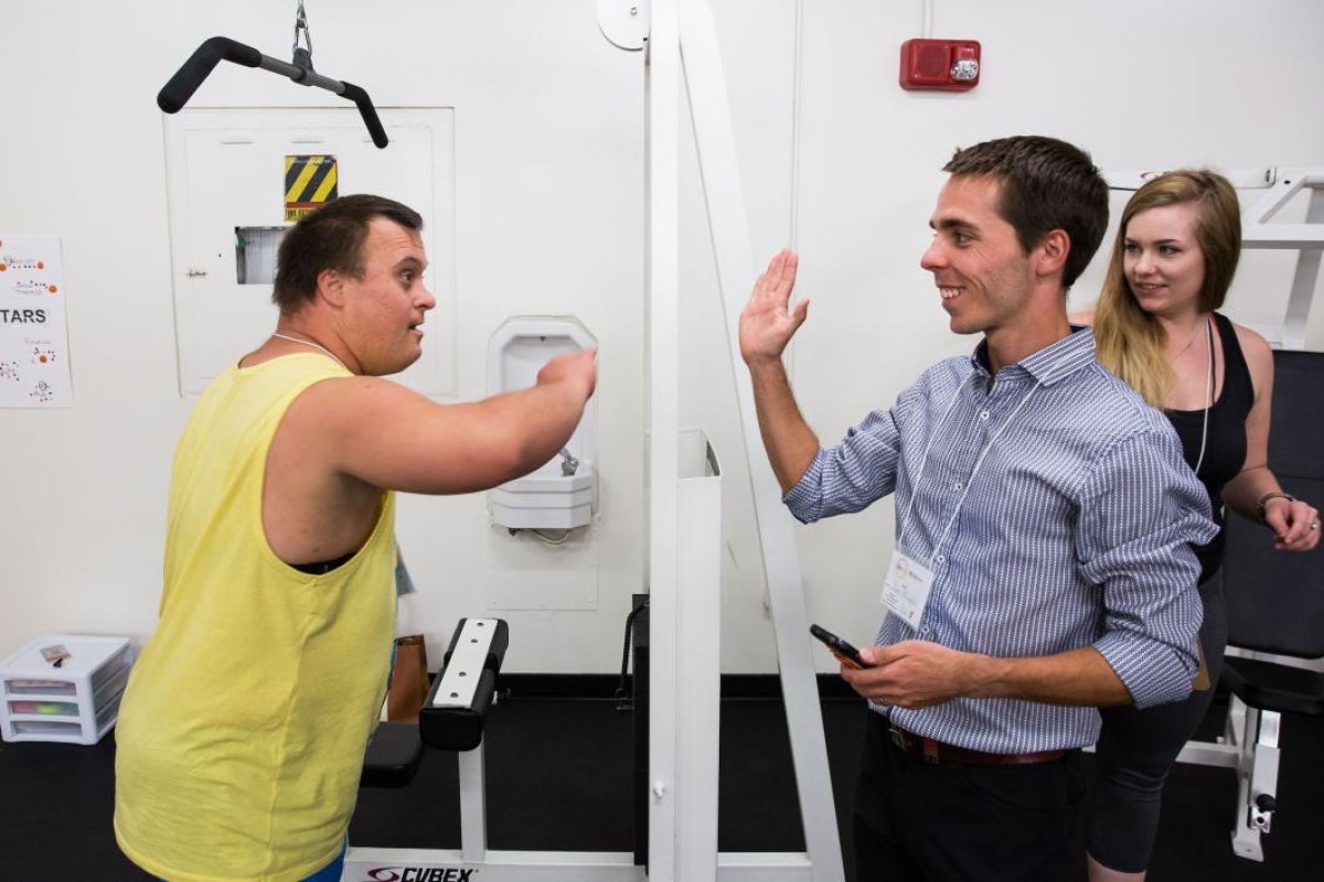 two men high-fiving