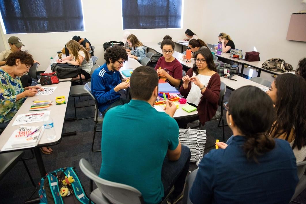 students making paper flowers