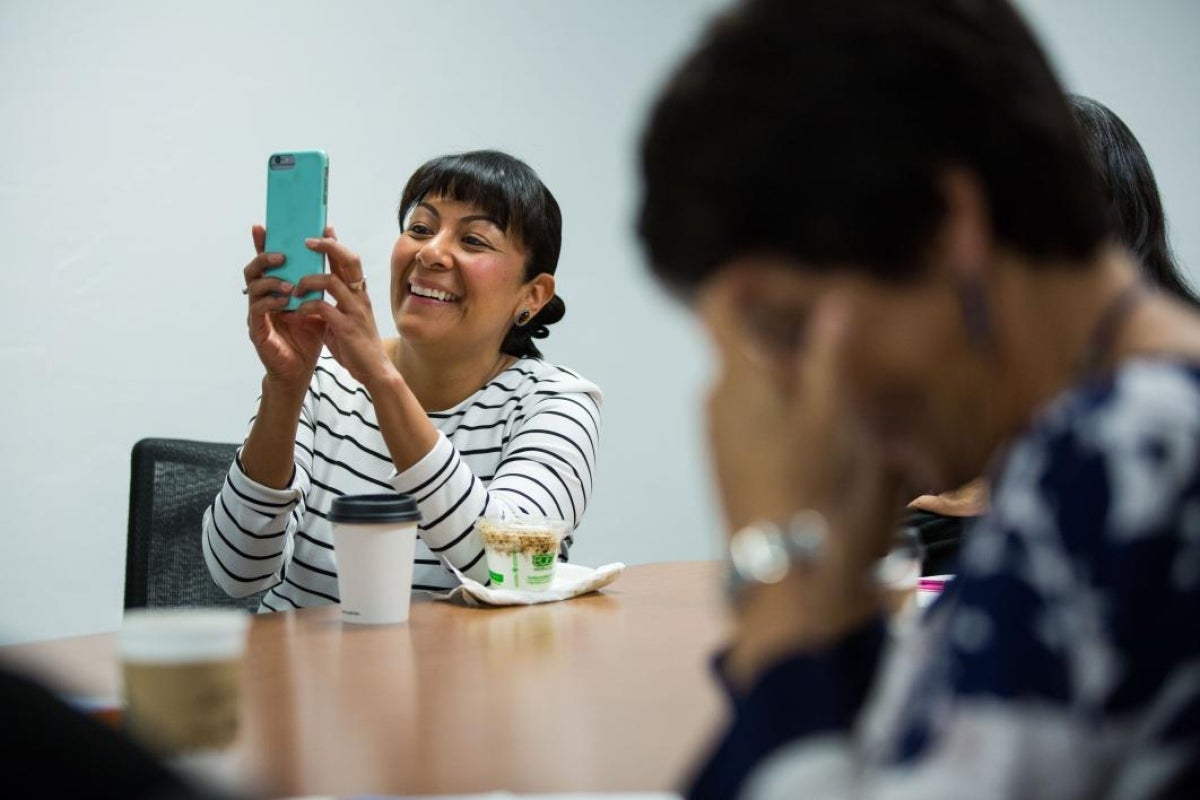 Woman holding smartphone