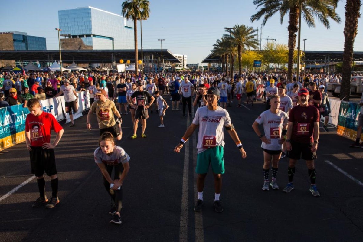 people stretching before race