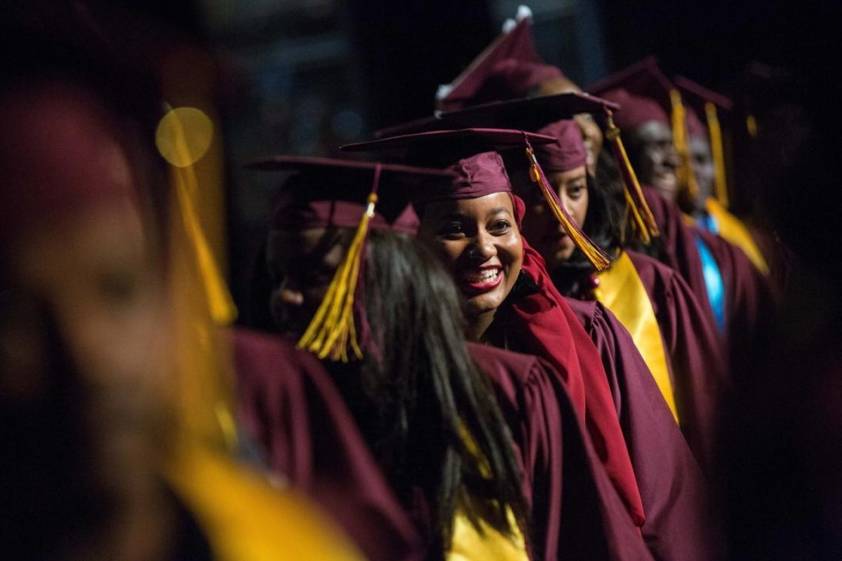 graduate smiling