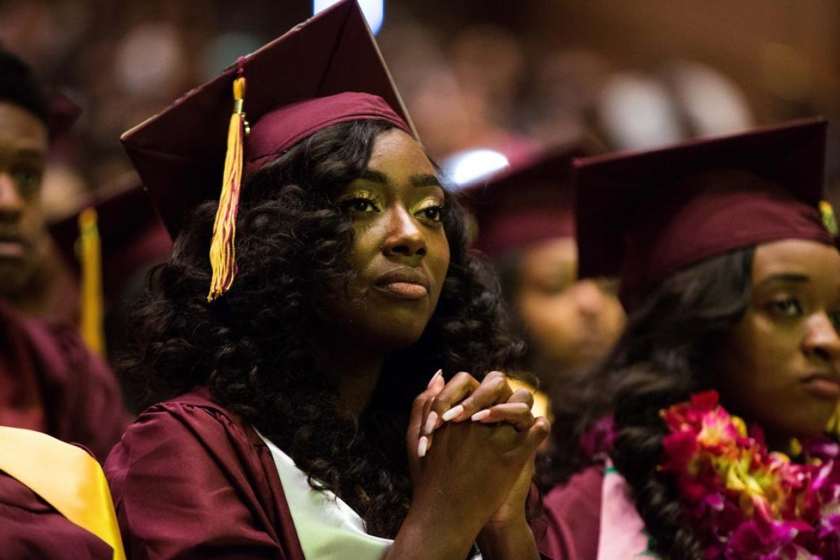 graduate listening during convocation