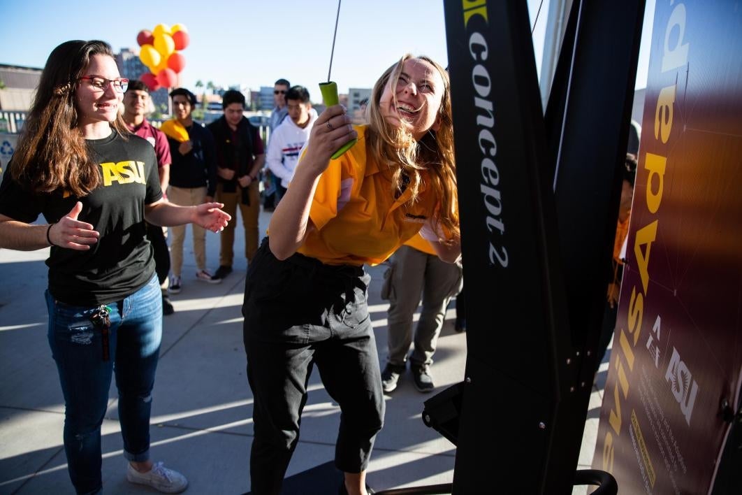 A student tries out the adaptive fitness challenge