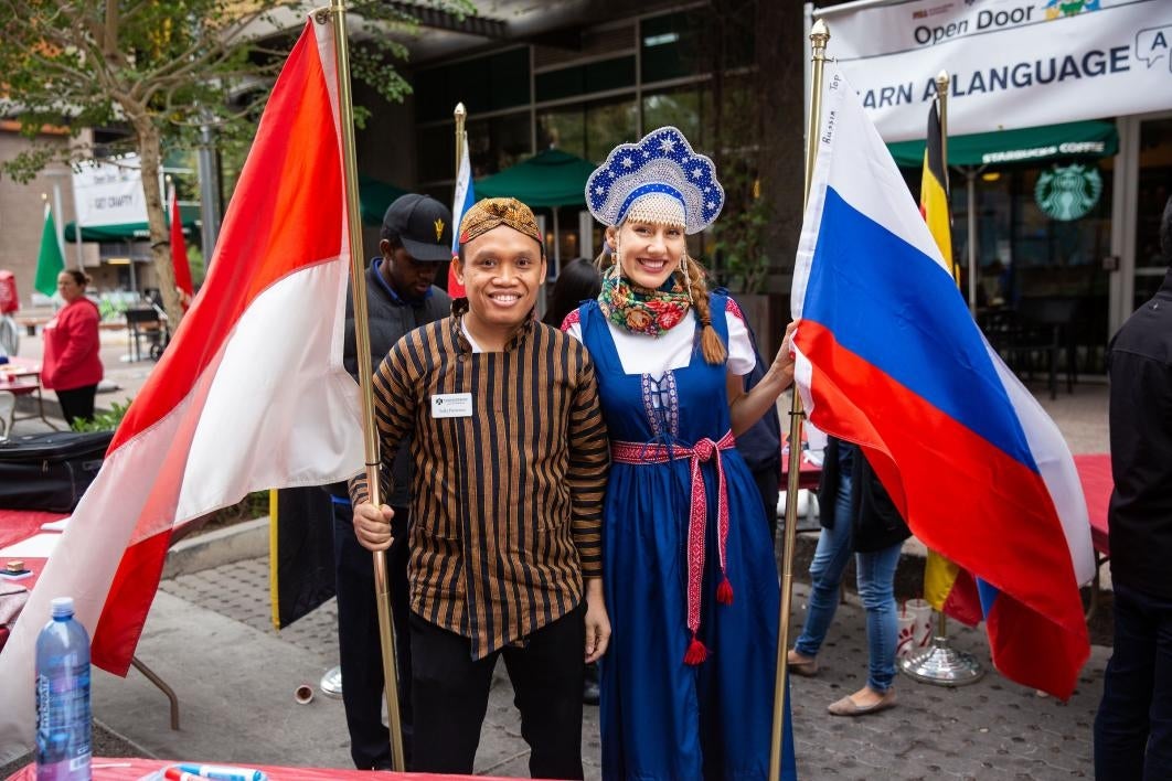 people wearing traditional garb