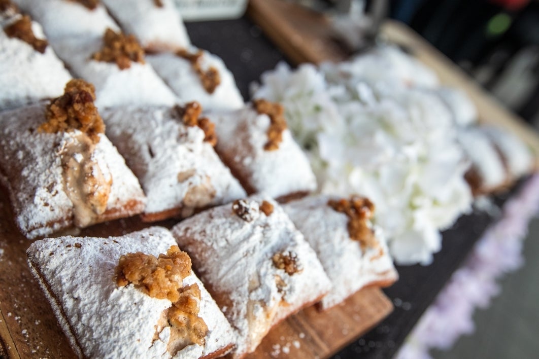 A closeup of Beignet Babe traditional French beignets