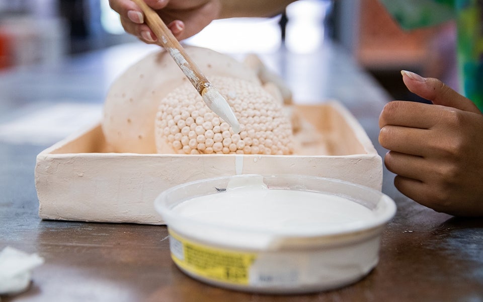 glazing a ceramic sculpture