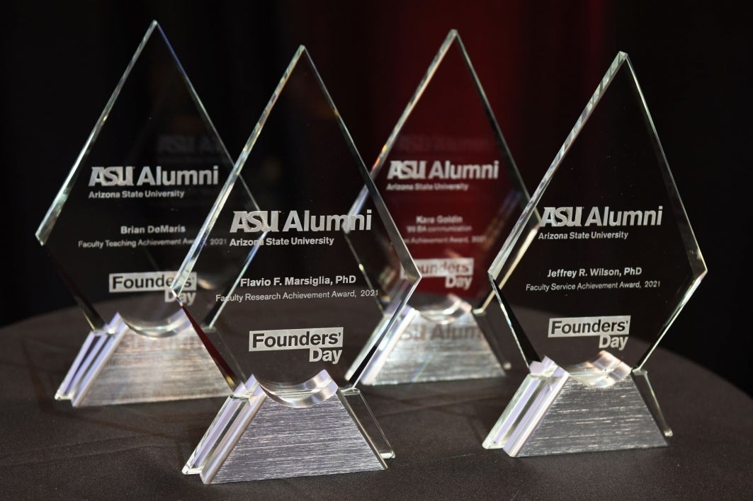 Glass awards on a table.