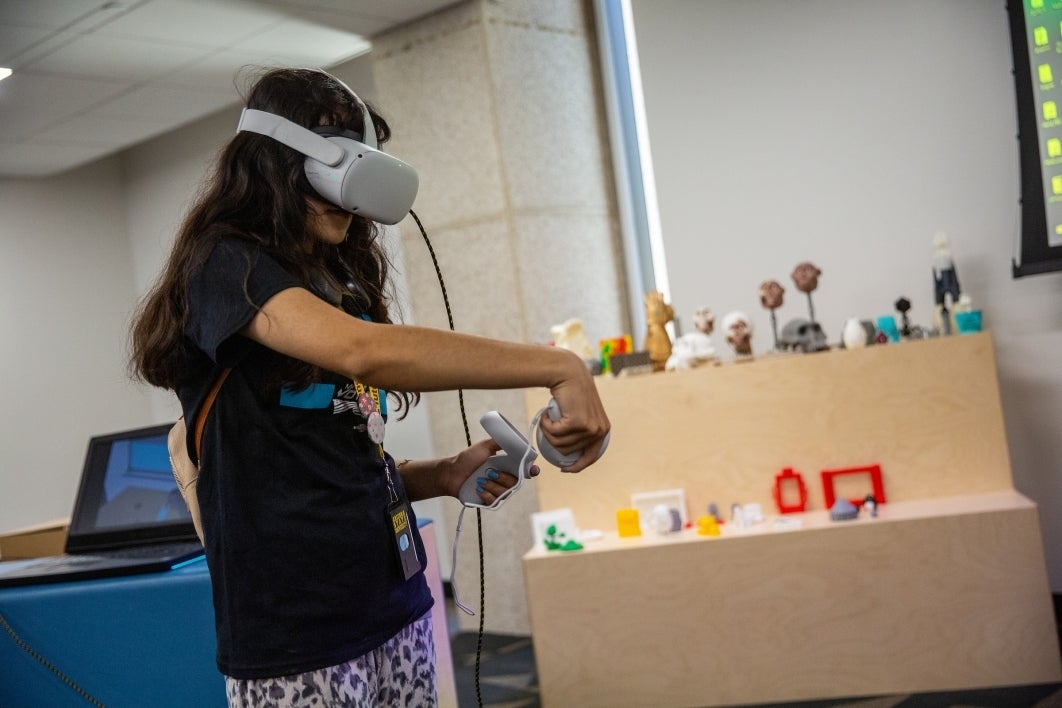 high school student using VR headset