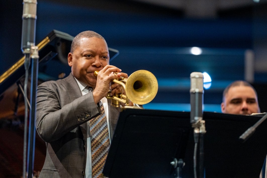 Man playing trumpet during event