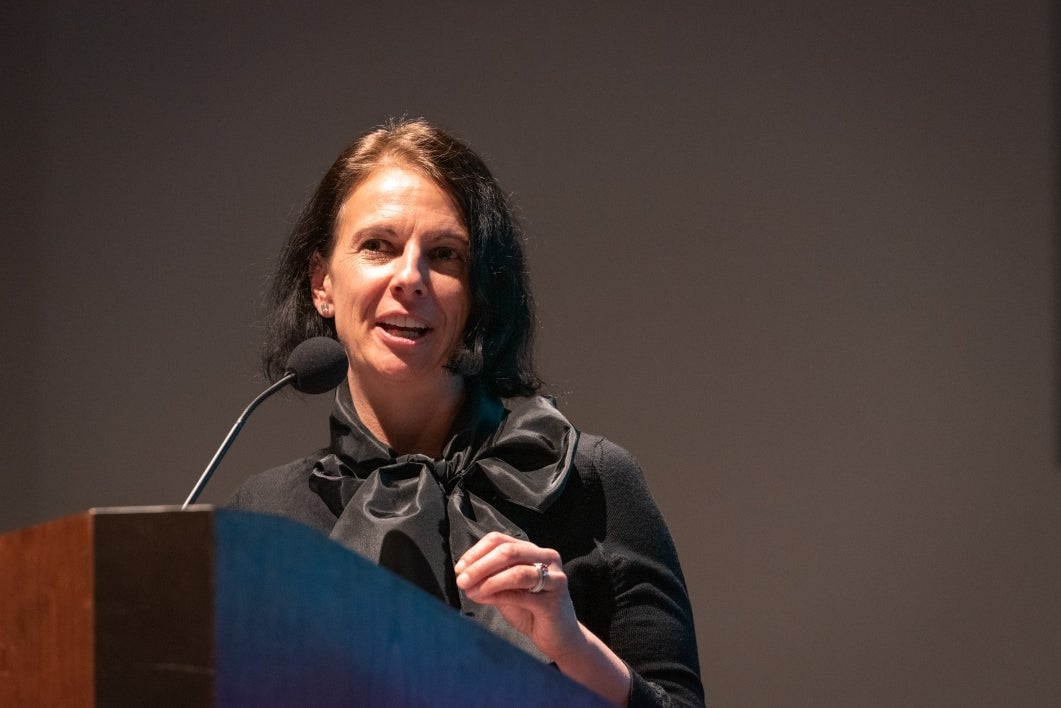 Woman speaking at podium