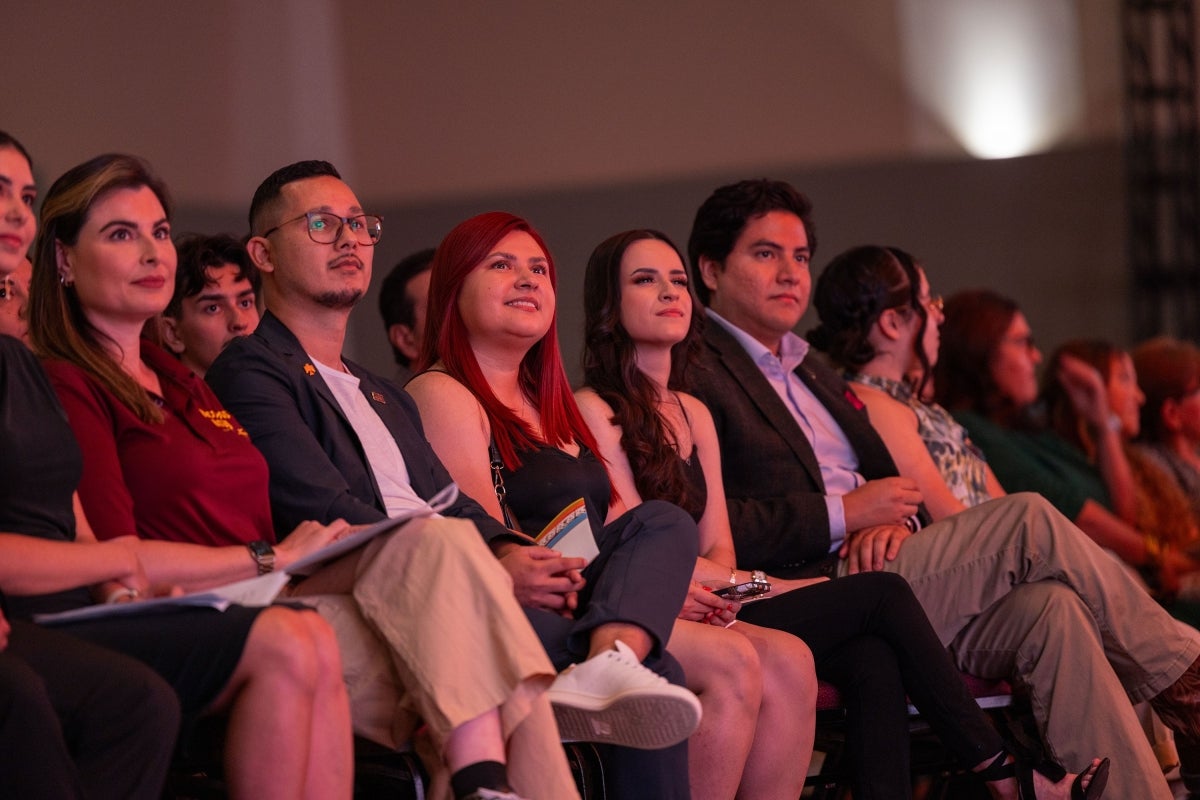 Audience looking up at screen