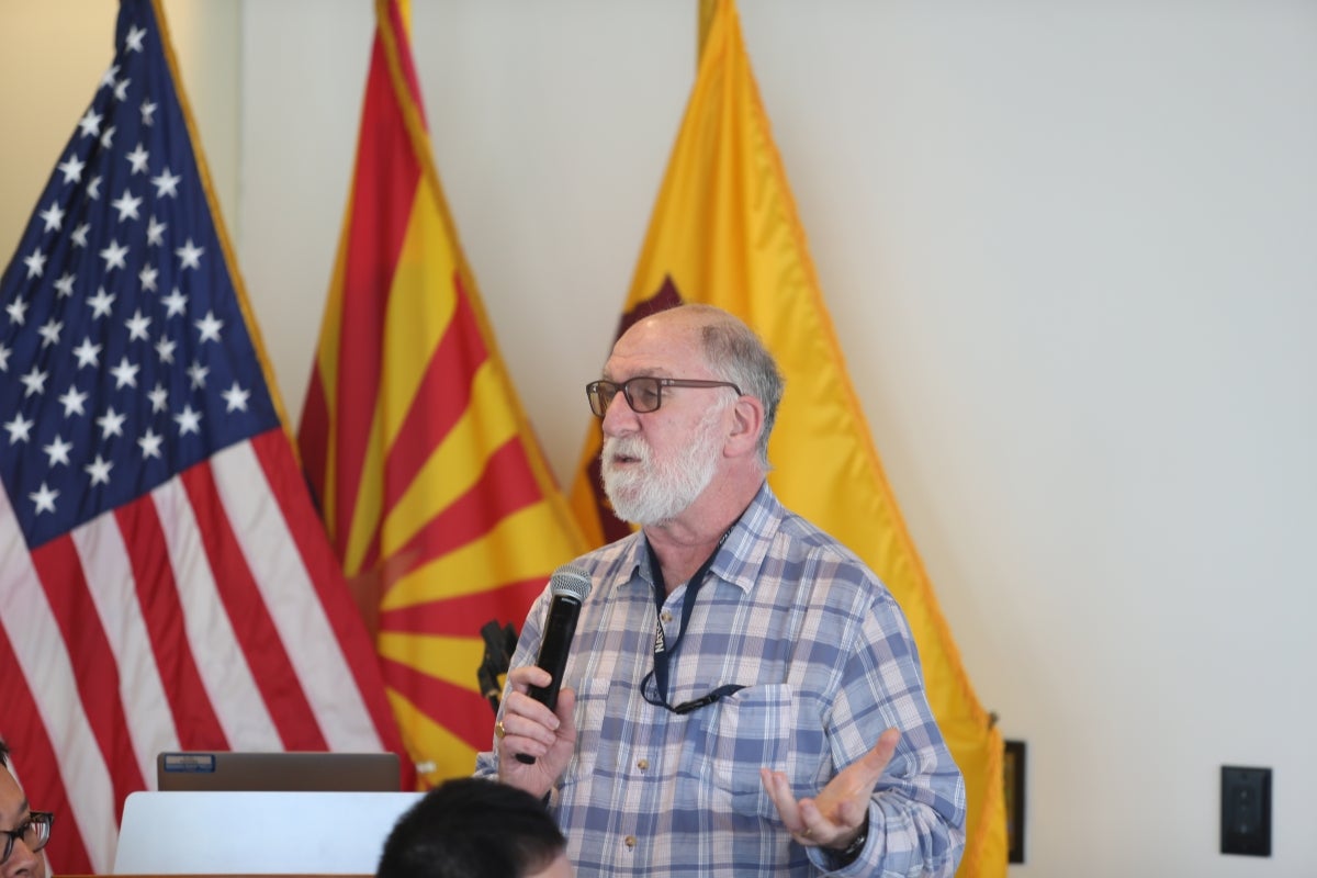 Clifford Weil speaking to an unseen audience